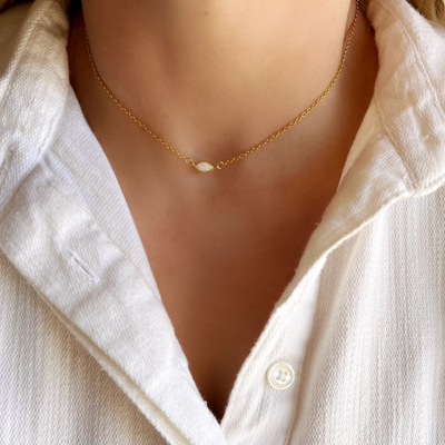 18k Gold Vermeil Opal Necklace featuring a vibrant opal pendant set in a sleek gold vermeil chain. This elegant necklace is perfect for adding a touch of sophistication and timeless beauty to any outfit.